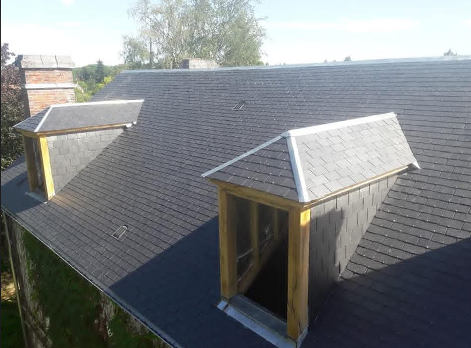 Maison de particulier en ardoise avec lucarnes bois
